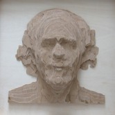 Portrait of David Engdahl made from wood.