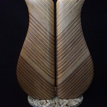 Laminated wood sculpture.