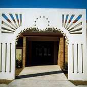 The precast concrete archway sculpture stands at the entrance to the Longbranch Community Center.