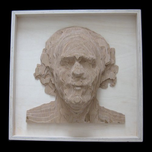 Laminated wood relief self-portrait.