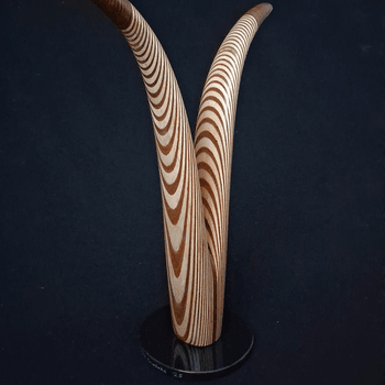 Laminated wood sculpture.