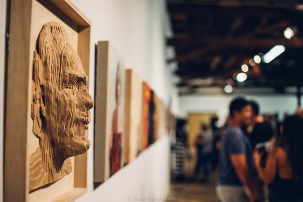 A side view of the laminated wood relief self-portrait