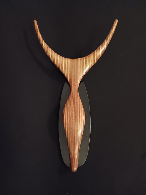 Laminated wood sculpture.