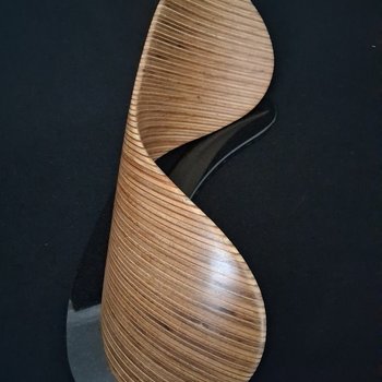 Laminated wood sculpture.