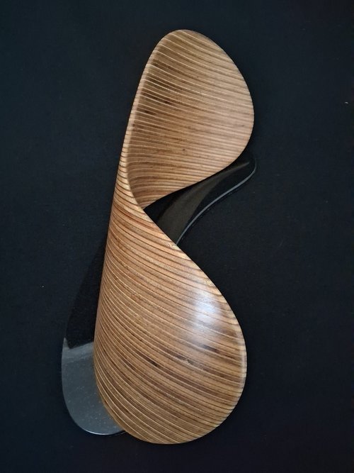 Laminated wood sculpture.